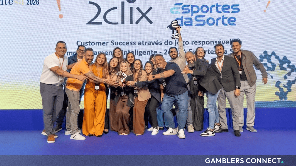 Esportes Gaming Brasil Wins Gold, Silver, and "Personality of the Year" at ClienteSA 2026 1 Representatives of Esportes da Sorte and EGB celebrating their customer success and operations awards on stage at the ClienteSA X-Summit.