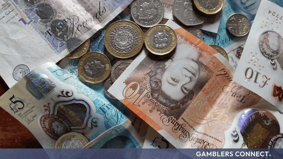 Close-up view of UK currency notes reflecting regulatory oversight and compliance enforcement within the gaming sector.