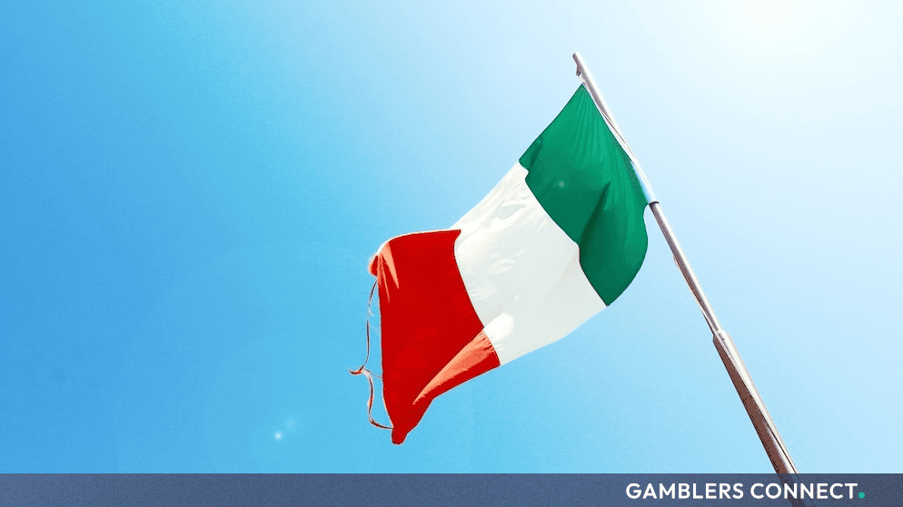 Italy Blacklists Polymarket Again, Clouding SS Lazio’s $22M Sponsorship Deal 1 The Italian national flag waving in the wind, representing the domestic penal laws and regulatory decrees governing Serie A football sponsorships.