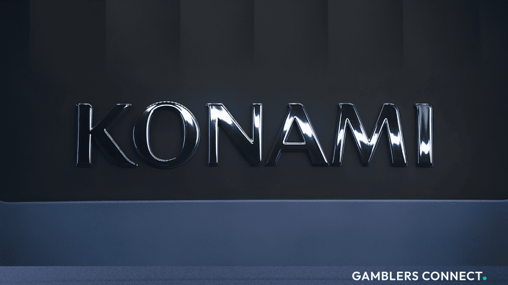 The prominent metallic silver Konami brand logo showcased in a modern corporate setting, representing the company's expansion into Japan's regulated casino industry.