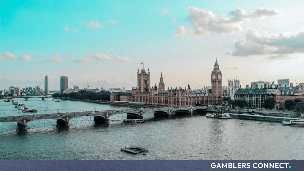 London cityscape featuring the Parliament buildings, illustrating the administrative hub for UK advertising codes and regulatory enforcement.