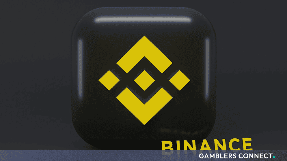 The yellow Binance brand logo displayed on a dark surface against a dark background.