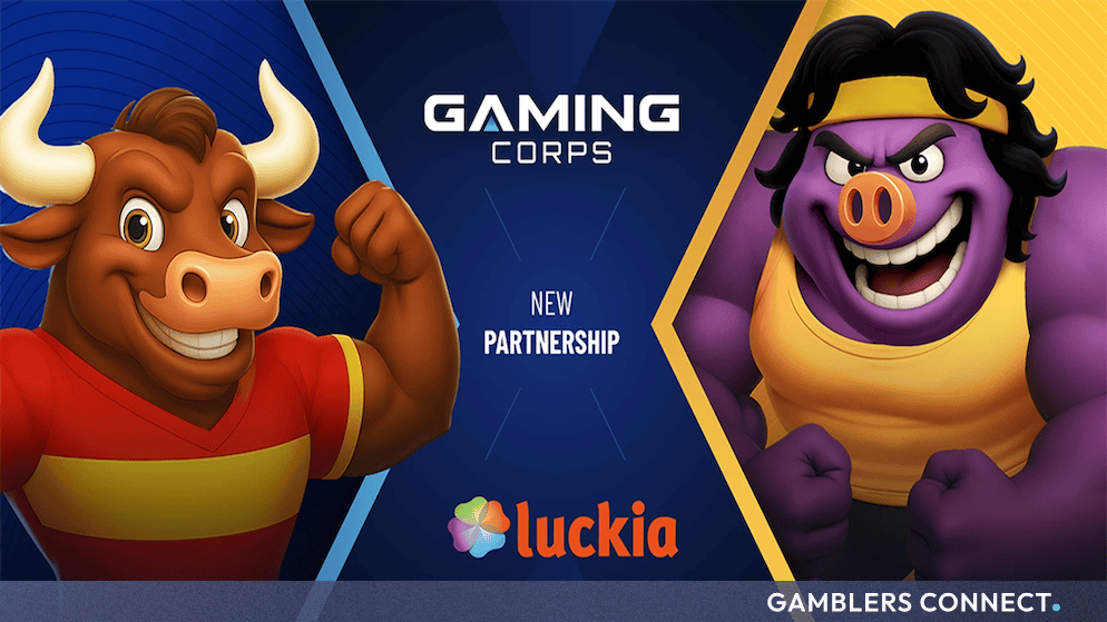 Promotional banner displaying the Gaming Corps and Luckia logos alongside vibrant character artwork from the developer's slot portfolio.