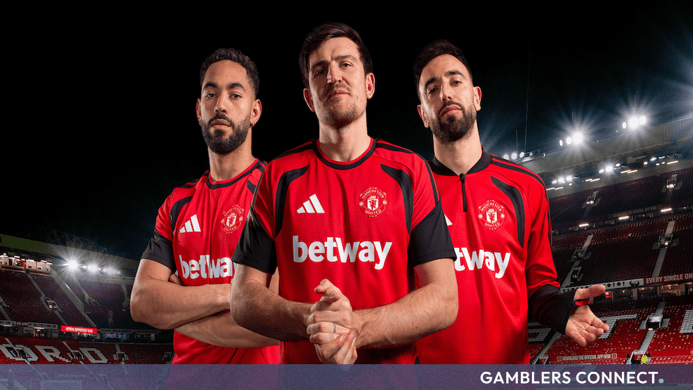 Manchester United players wearing the new training kits featuring the Betway sponsor logo at Old Trafford.