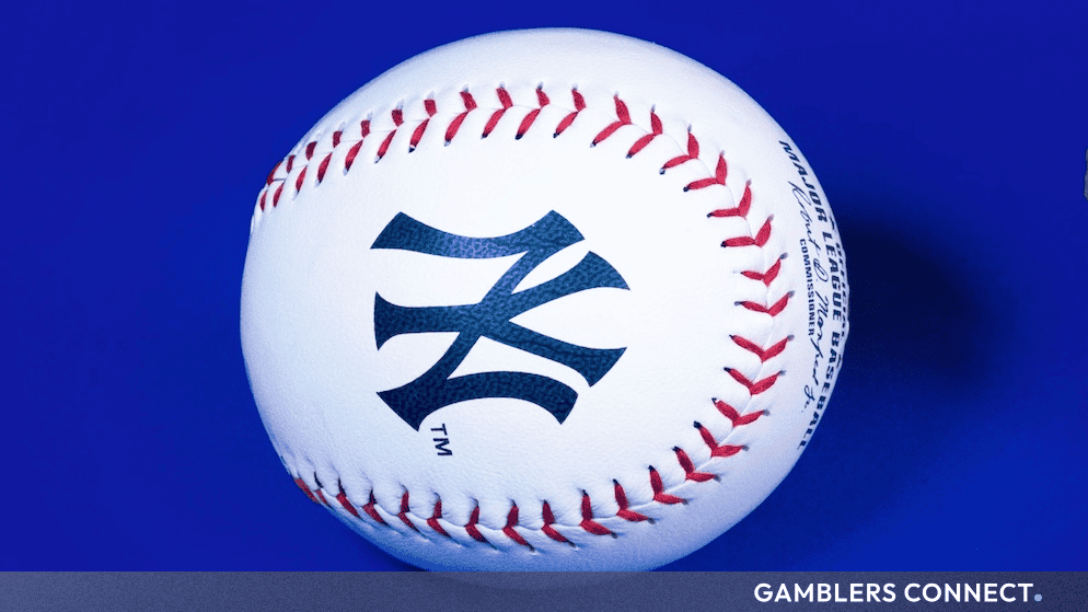 Official Major League Baseball featuring the New York Yankees logo resting on a solid blue surface.