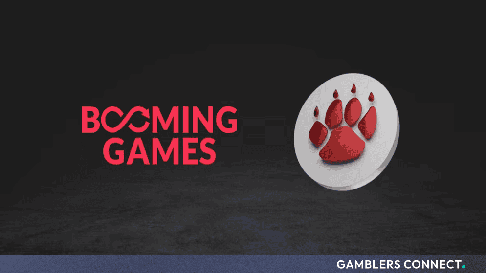 Booming Games corporate logo featuring a red paw print emblem against a dark textured background.