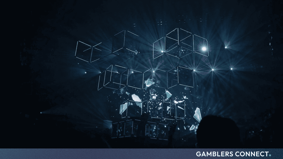 Abstract digital graphic featuring glowing interconnected geometric cubes and light beams in a dark environment, representing advanced surveillance AI.