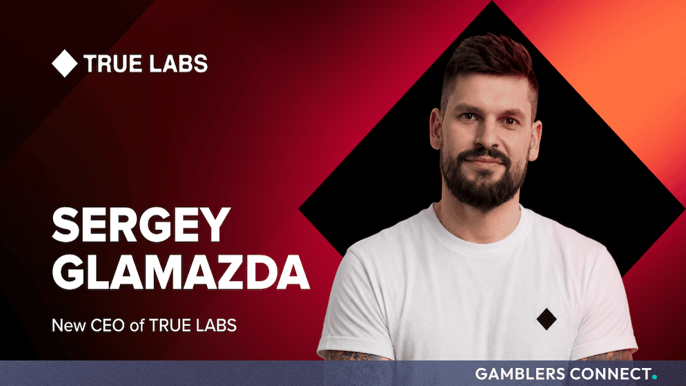 Professional portrait of Sergey Glamazda, the newly appointed CEO of True Labs, against a branded corporate background.