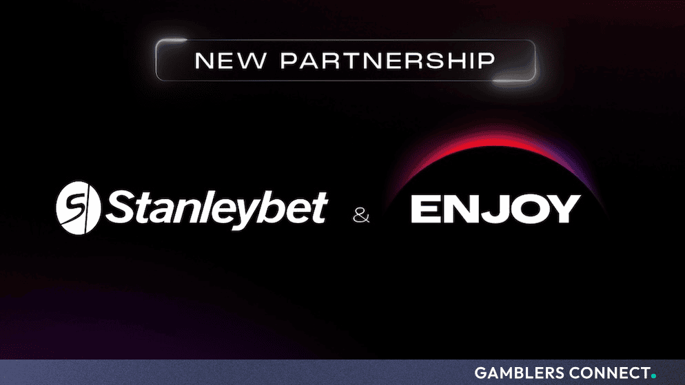 Corporate announcement banner featuring the Stanleybet and ENJOY brand logos under a glowing "New Partnership" header against a dark background.