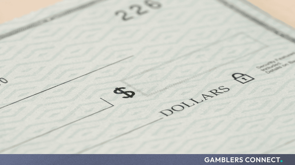 Close-up shot of a financial check detailing currency and monetary fields.