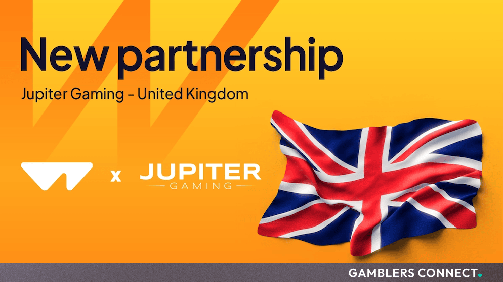 Official partnership graphic featuring the Wazdan logo alongside the Jupiter Gaming brand and a United Kingdom flag on an orange background.