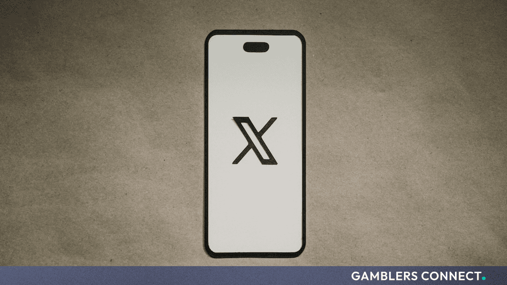 A stylized illustration of a smartphone displaying the X logo on a textured background, representing the new Cashtag trading integration.