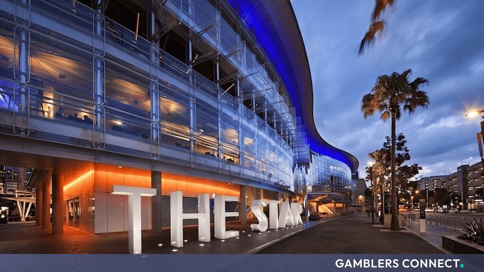 Exterior architecture of Star Entertainment casino resort featuring modern glass paneling and exterior lighting