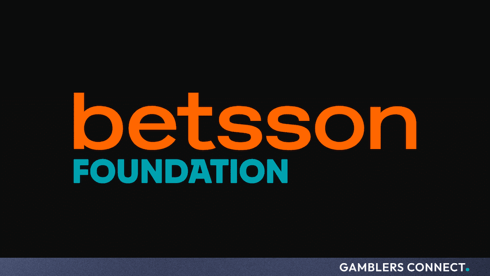 Betsson Foundation official logo in orange and turquoise text against a dark background.