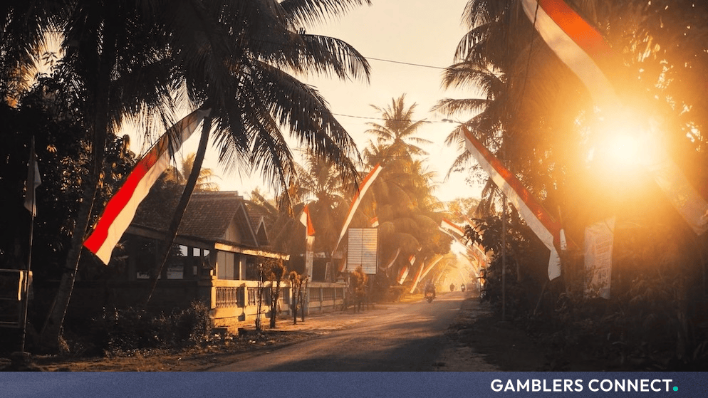 Indonesian landscape with traditional flags during government enforcement against online gambling