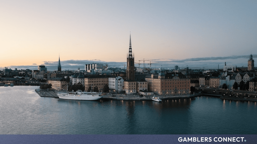 Evening cityscape of Stockholm waterfront and historic architecture representing regulatory oversight in Sweden