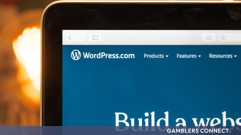 Close-up of a laptop screen displaying the WordPress website builder interface.